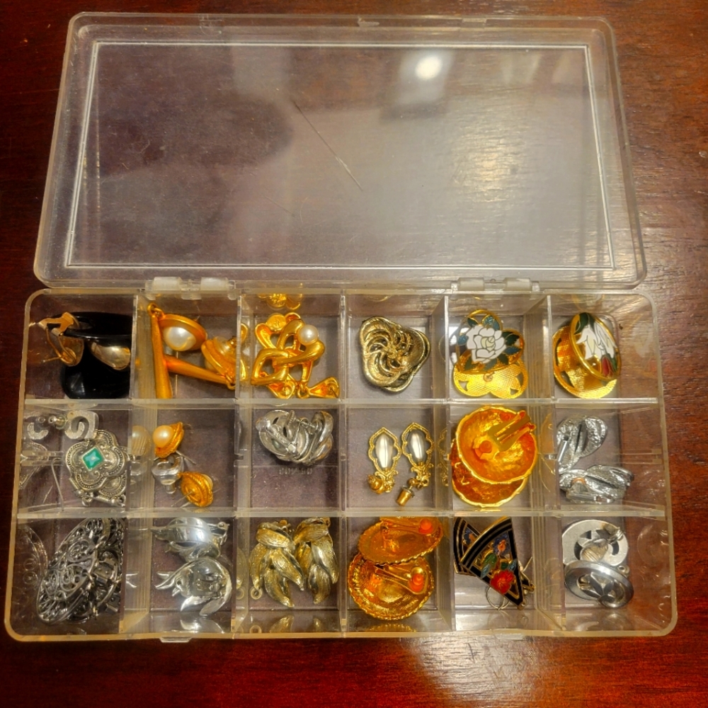 18 pairs of earrings,  posts and clips.
